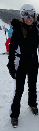 Customer photo review of Women's Minimalist Faux Fur Black & White Down One-piece Ski Suits