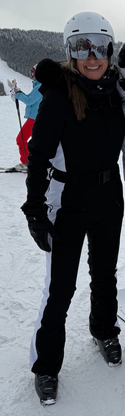 Customer photo review of Women's Minimalist Faux Fur Black & White Down One-piece Ski Suits
