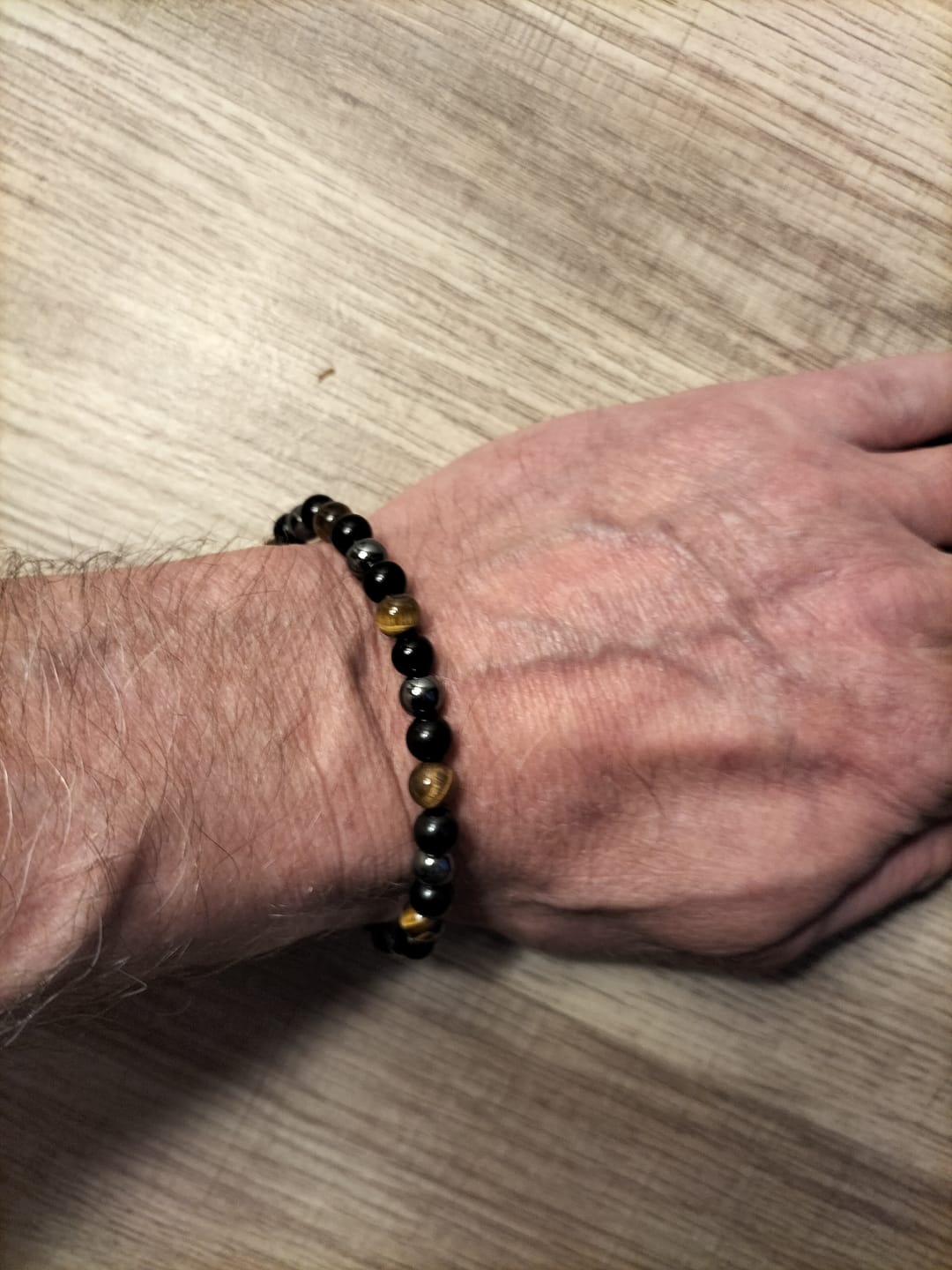 Customer photo review of Bracelet "Triple Protection" en Hématite, Oeil de Tigre et Obsidienne