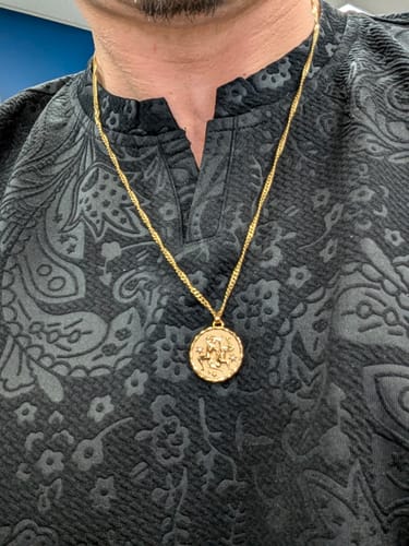 Customer photo review of Gemini Amulet Pendant