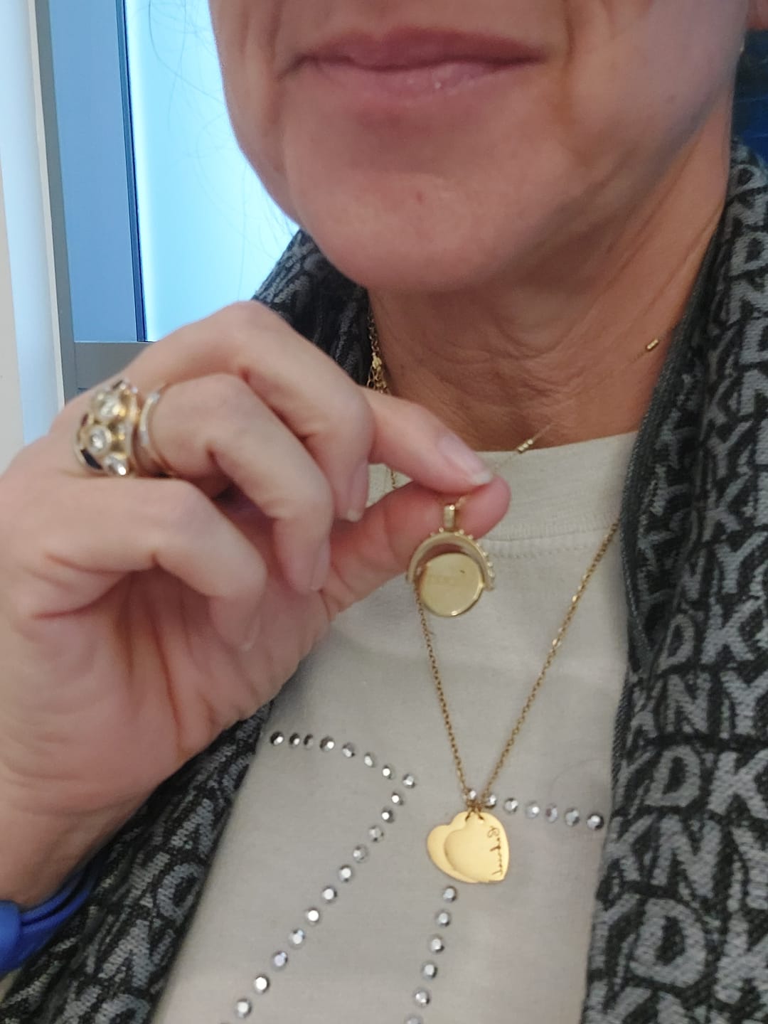 Customer photo review of Engravable Spinning Necklace