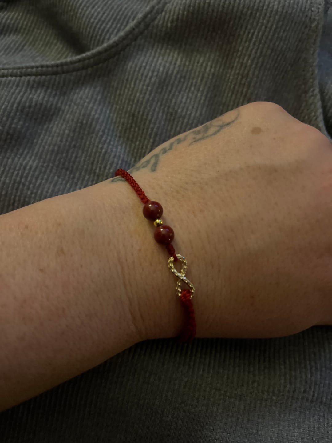Customer photo review of Buddha Stones Cinnabar Blessing Red String 14K Gold Infinity Symbol Bracelet Anklet