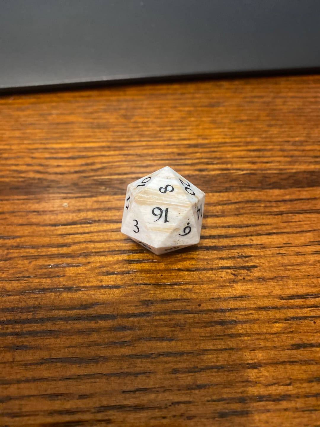 Customer photo review of URWizards D&D Petrified Wood Gemstone Engraved Dice Set(Limited edition)