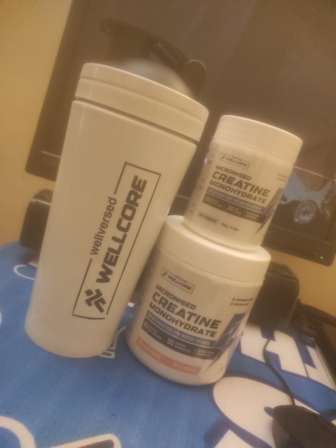 Customer photo review of Wellcore - Micronised Creatine Monohydrate (83 Servings, Tropical Tango) + Creatine (33 Servings, Unflavoured) + Steel Shaker | Muscle Growth & Recovery