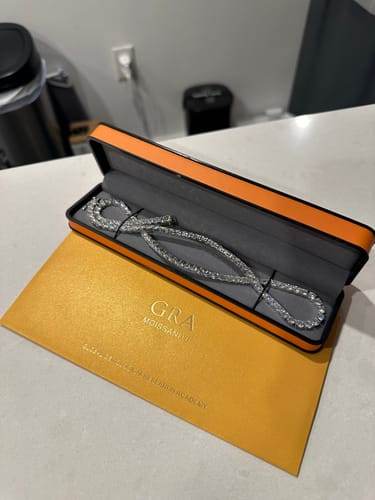 Customer photo review of VVS1 Moissanite Diamond 925 Sterling Silver Tennis Chain in White Gold