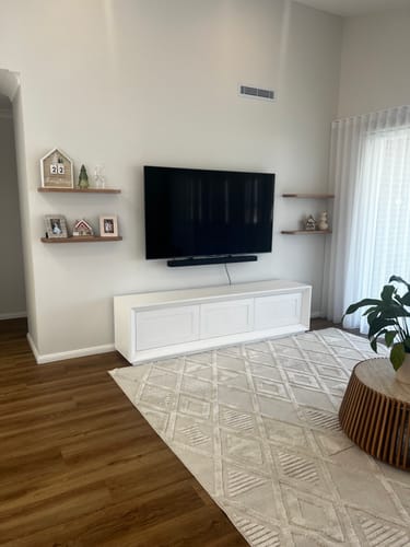 Customer photo review of Curved Floating Shelf