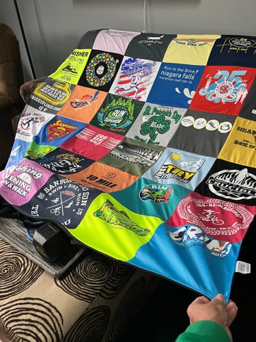 T-shirt quilt with running, marathons themes by Lori from MI