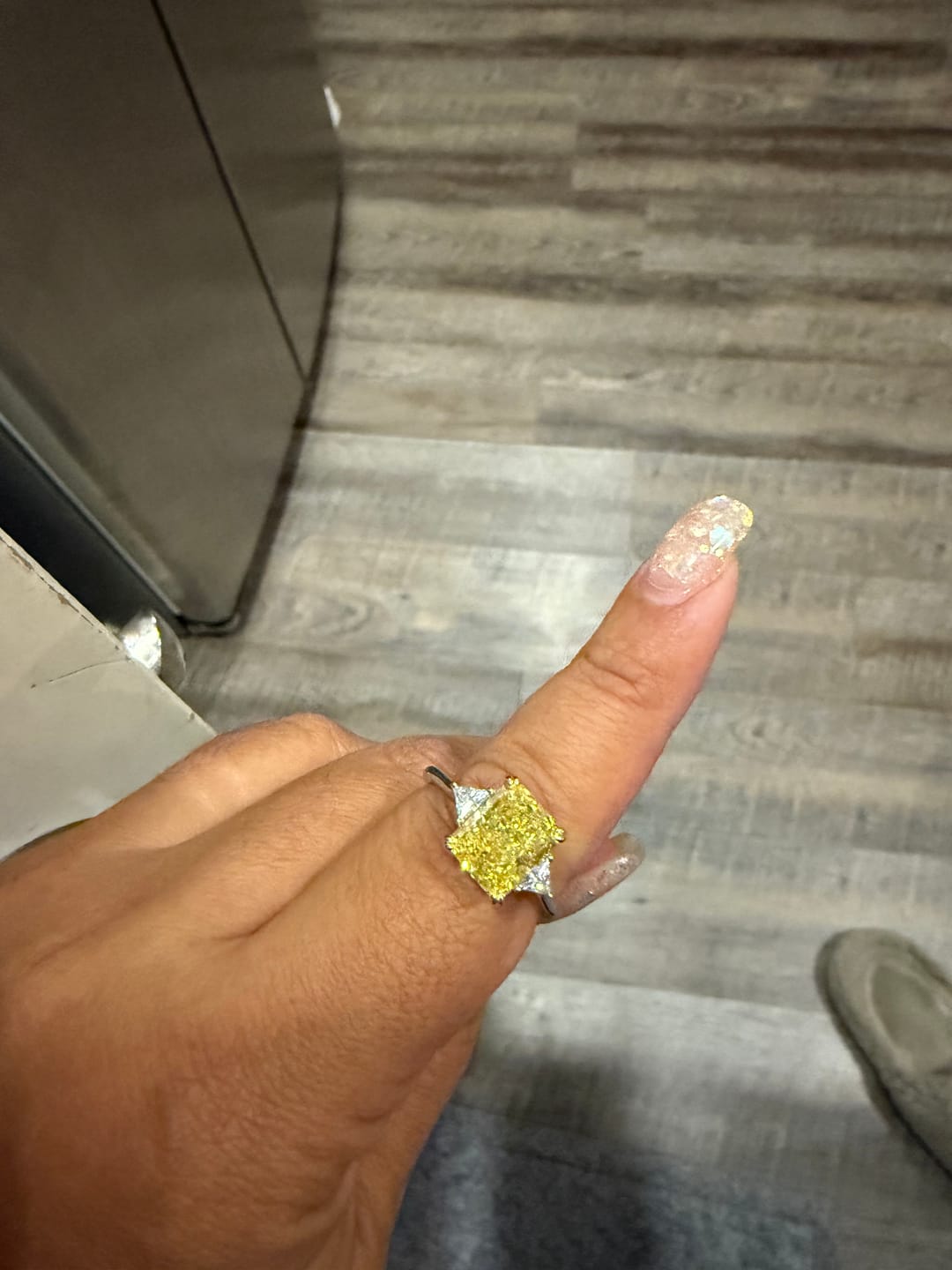 Customer photo review of S925 4.0Ct Radiant & Triangle Cut Yellow Stone Three Stone Engagement Ring In Sterling Silver
