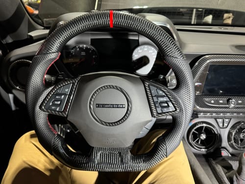 Customer photo review of Real Carbon Fiber Steering Wheel for Chevrolet Camaro 2016-2024 6th Generation & Chevrolet Corvette C7 2014-2019, D-shaped Flat-Bottom Perforated Leather Grip IN STOCK