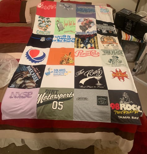 T-shirt quilt with travel, music themes by Penny from NY