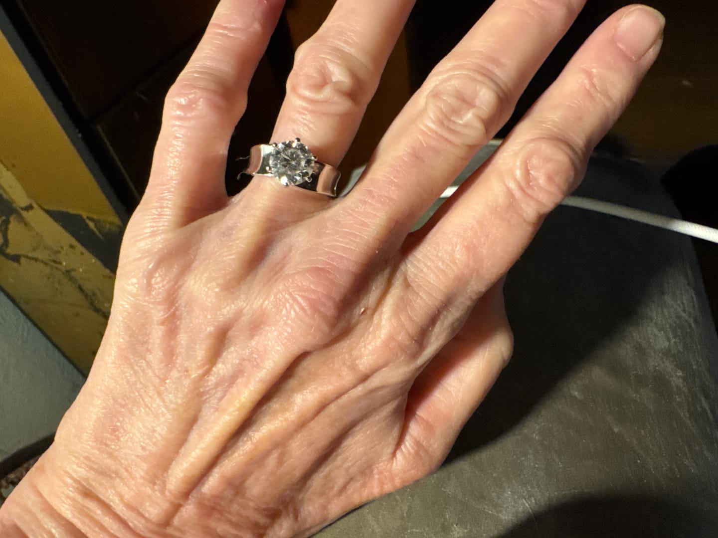 Customer photo review of Solitaire Round Moissanite Concave Wide Band Engagement Ring