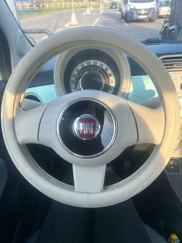 Customer photo review of Napa Leather Perforated Patchwork Car Steering Wheel Cover, Non-slip, Breathable, Universal 15 Inch (Approx. 38cm)