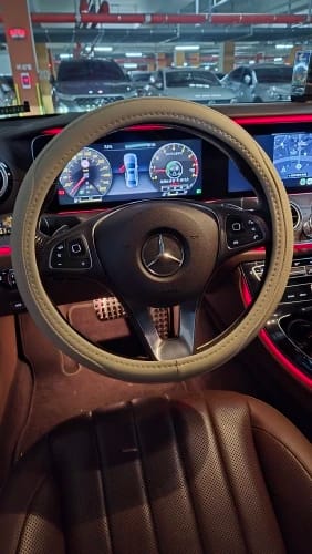 Customer photo review of Napa Leather Perforated Patchwork Car Steering Wheel Cover, Non-slip, Breathable, Universal 15 Inch (Approx. 38cm)