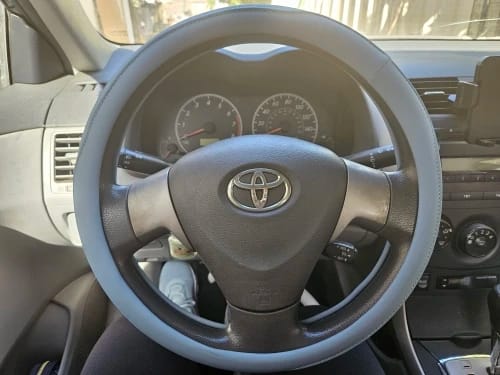 Customer photo review of Napa Leather Perforated Patchwork Car Steering Wheel Cover, Non-slip, Breathable, Universal 15 Inch (Approx. 38cm)