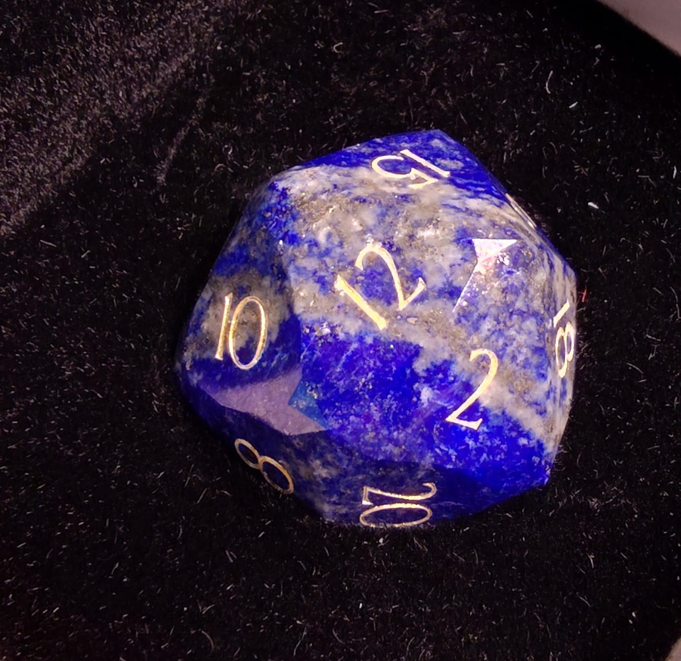 Customer photo review of URWizards D&D Multi-faceted Gemstone Engraved Dice Set