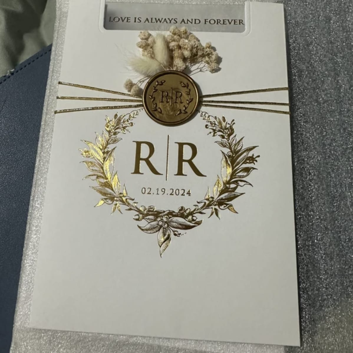 Customer photo review of White and Gold Acrylic Wedding Invitation