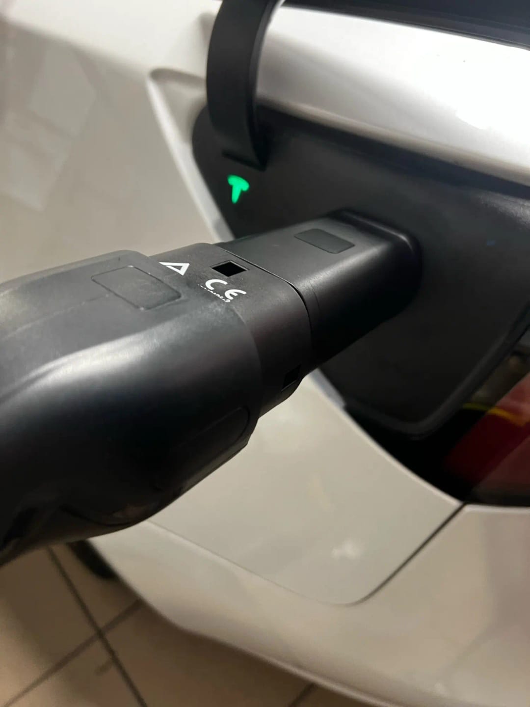 Customer photo review of Tesla adapter from type 2 to USA Tesla connector