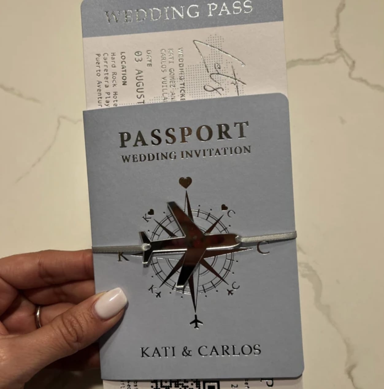 Customer photo review of Baby Blue Boarding Pass Wedding Invitation with Silver Foil