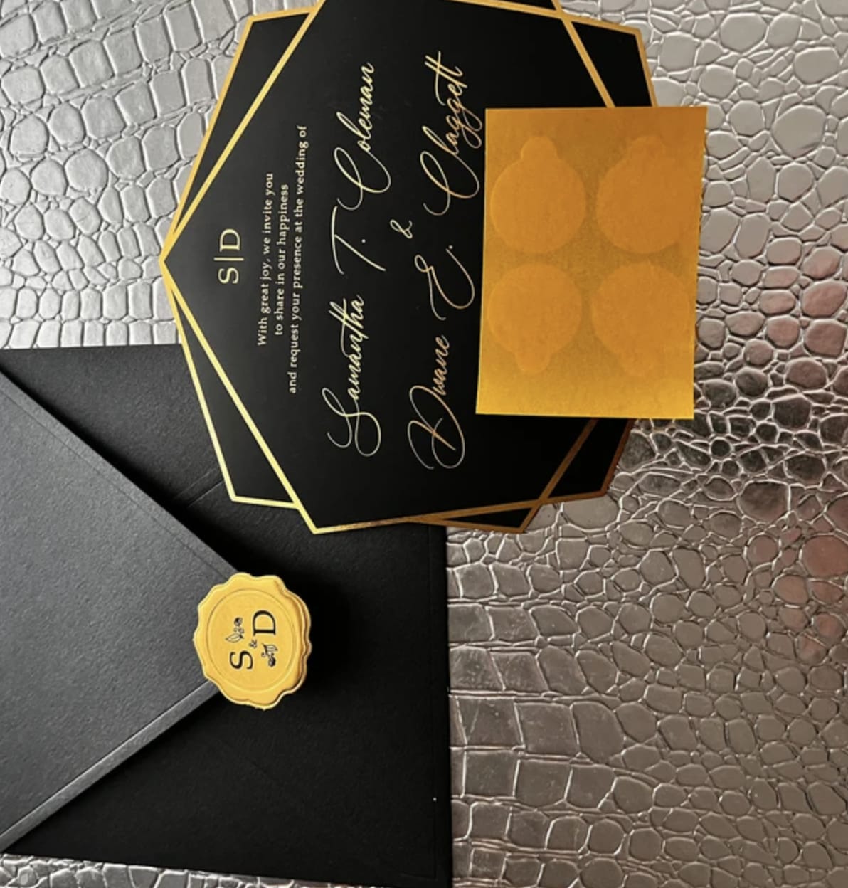 Customer photo review of Black Acrylic Wedding Invite with Gold Foil Letters
