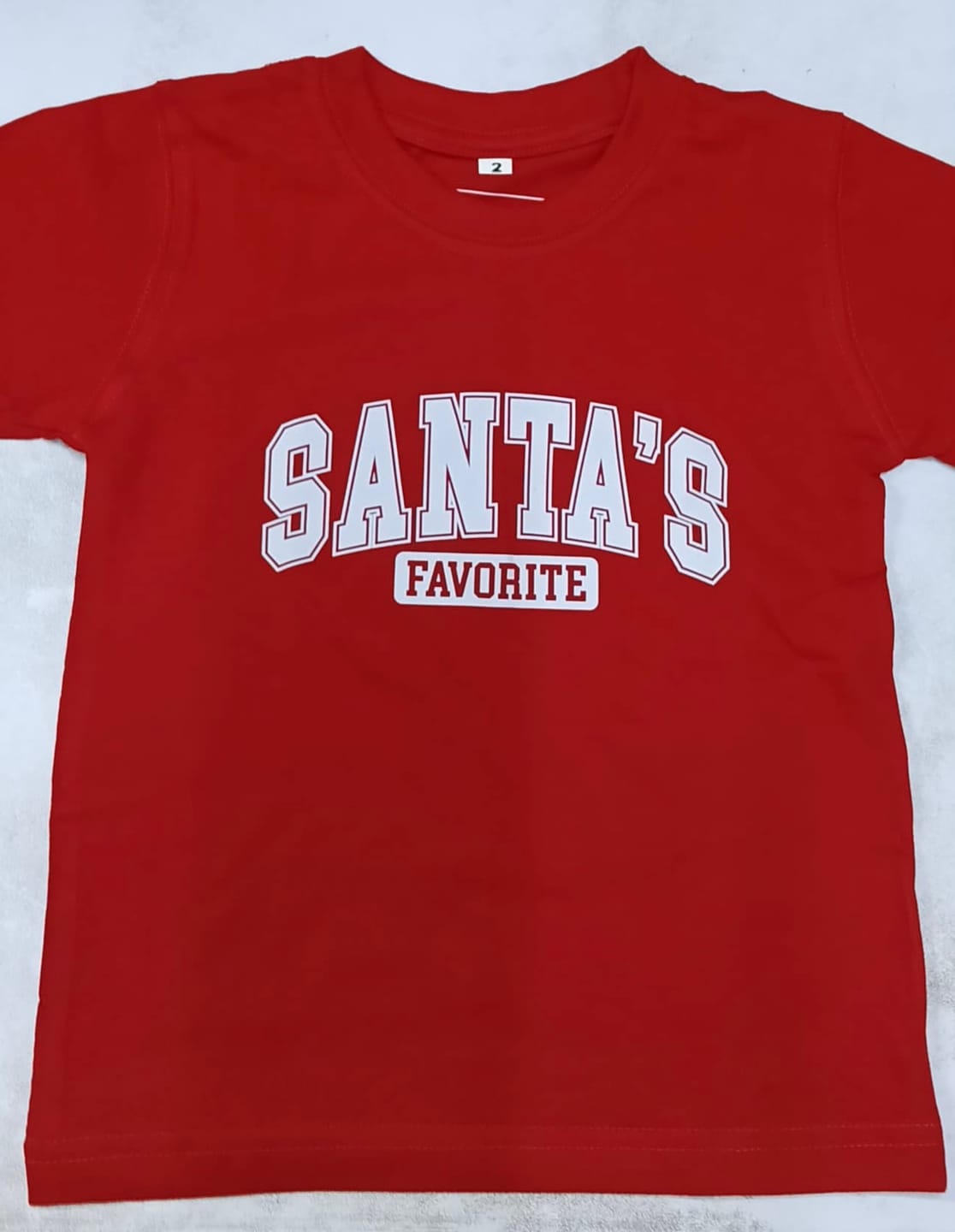 Customer photo review of "Santa's Favorite" Christmas T-Shirt – Festive Red & White Tee for Holiday Cheer | Unisex Fit