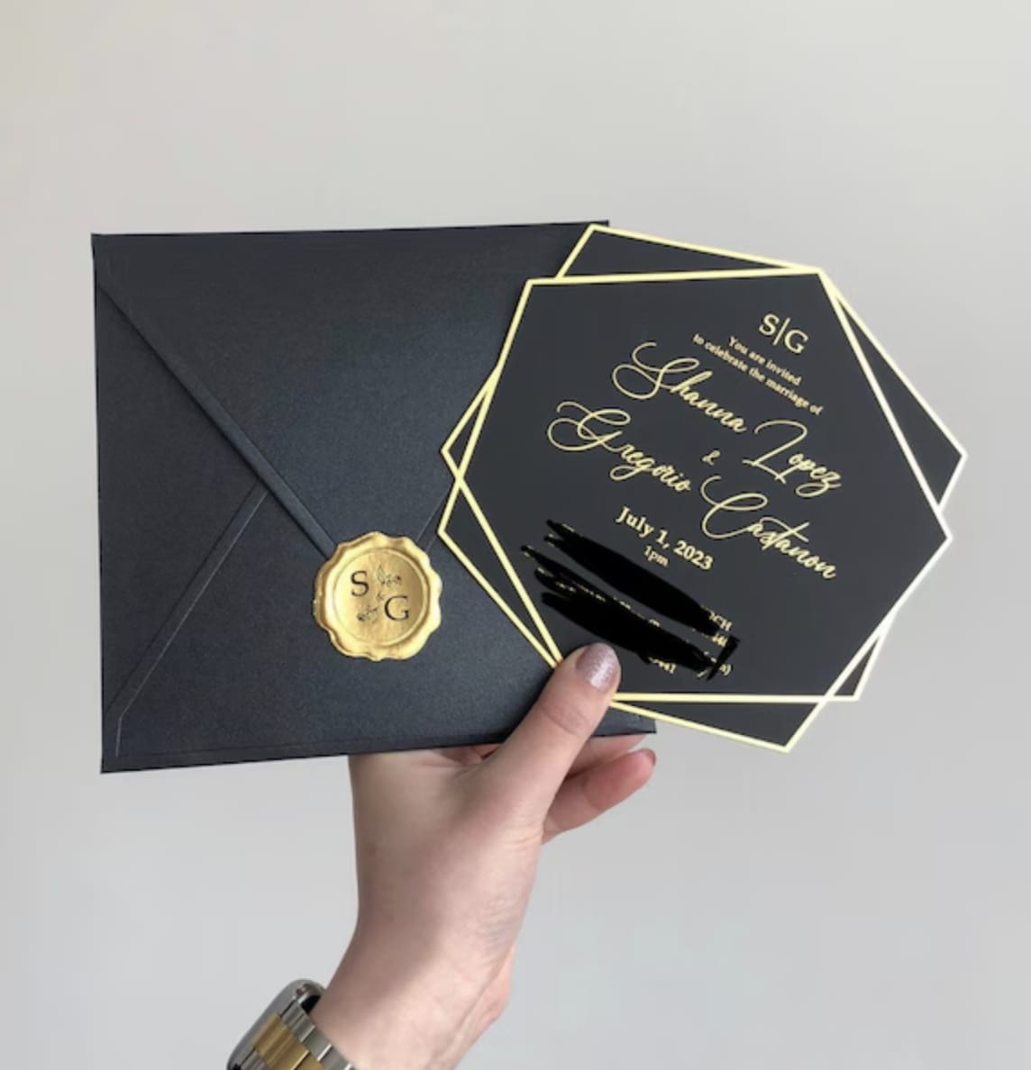 Customer photo review of Black Acrylic Wedding Invite with Gold Foil Letters