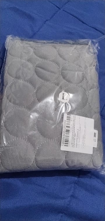 Customer photo review of Summer Cooling Mat for Pets - Extra Large Durable Cold Bed, Ice Pad, and Blanket for Dogs and Cats