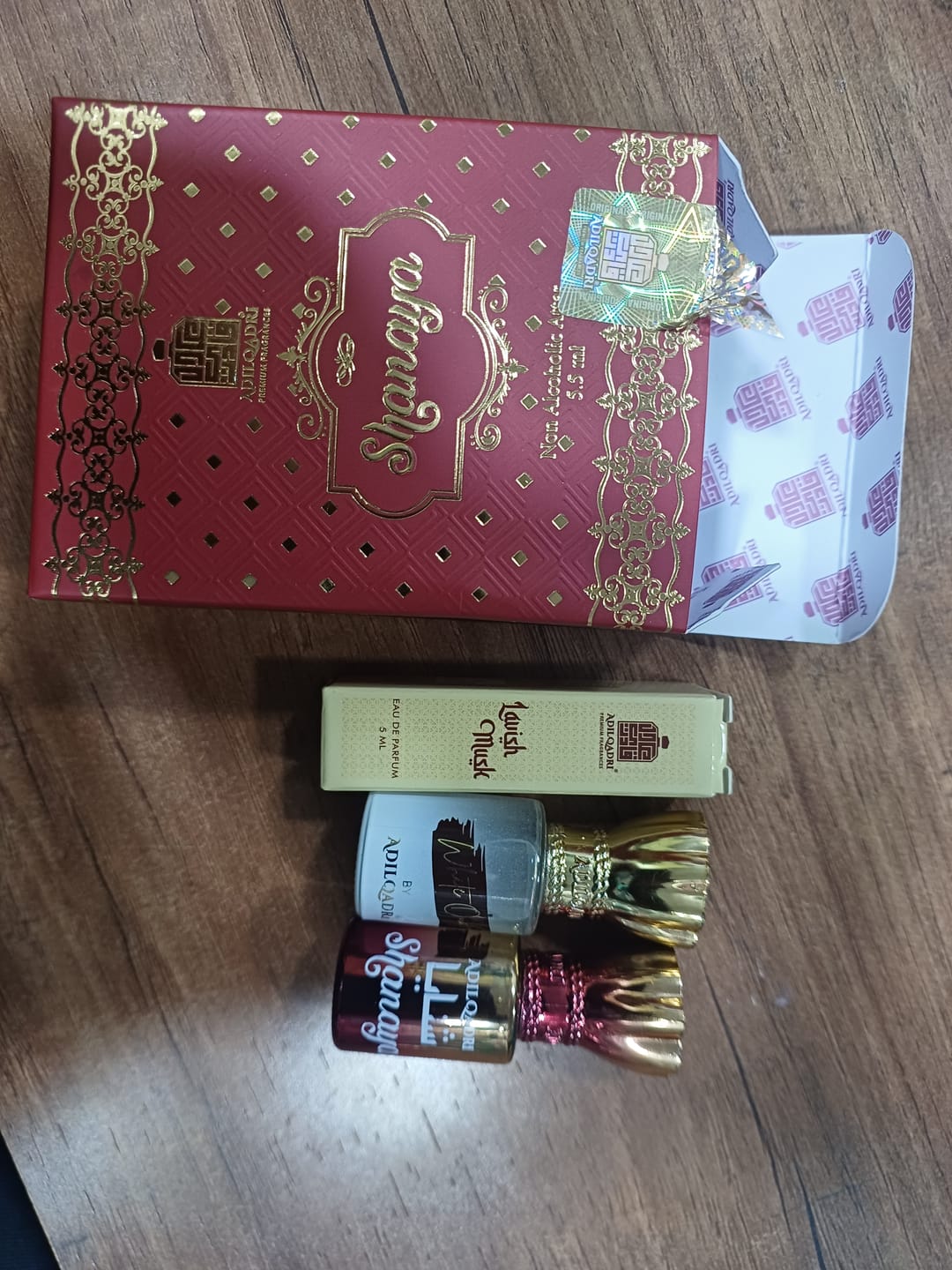 Customer photo review of 2 Pcs Attar Set Shanaya And White Oudh 5.5 Ml Each