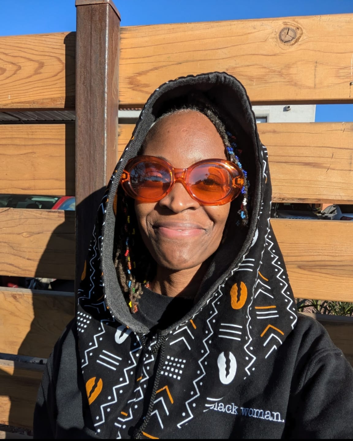 Customer photo review of Cache-cou avec Capuche Réversible en Tricot et Pagne Africain – Gris et Bogolan