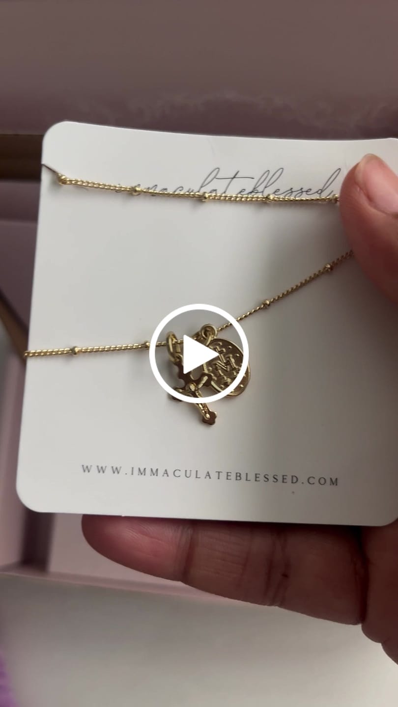 Customer video review of Petite Miraculous Medal + Petite Crucifix Gold Filled Satellite Chain Necklace