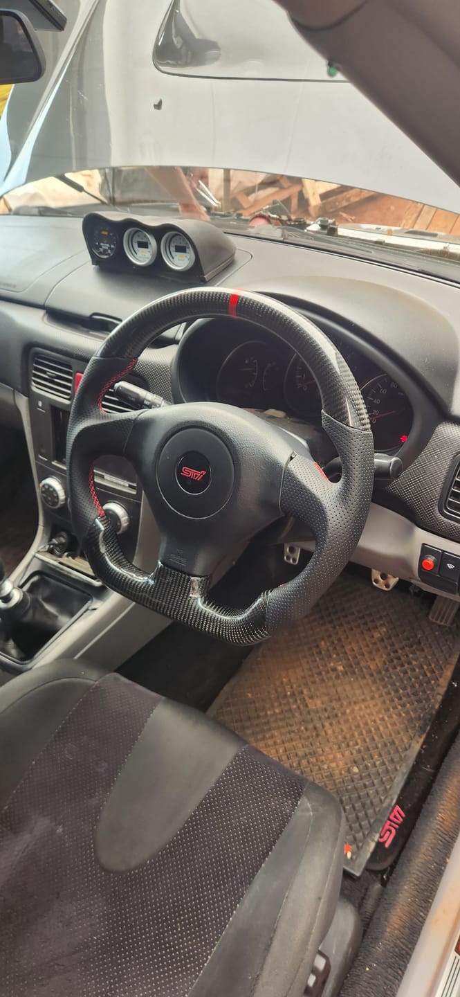 Customer photo review of 2005-07 Subaru WRX STI Carbon Fiber Steering Wheel