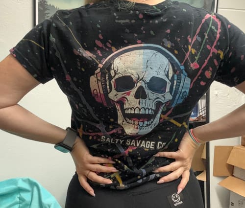 Customer photo review of Salty Savage Ladies “DEAD BEATS” Paint Splatter Crop Tee | Business in the Front, Party in the Back