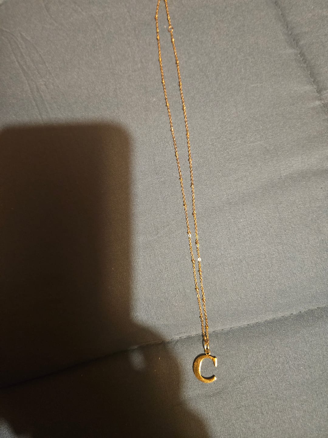 Customer photo review of C Initial Pendant Necklace In Gold + FREE Diamond Stud Earrings in Gold