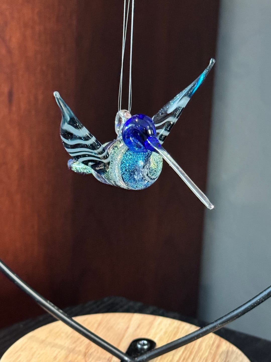 Customer photo review of Dichroic Twist Glass Hummingbird with Infused Ash