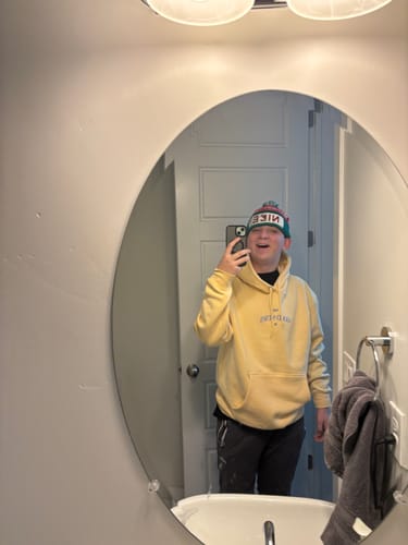 Customer photo review of The Good News Hoodie