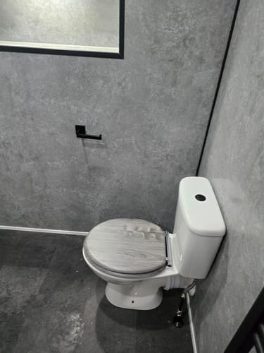 Customer photo review of Premium Grey Concrete Matt Shower Wall Panel – 2400 x 1000mm