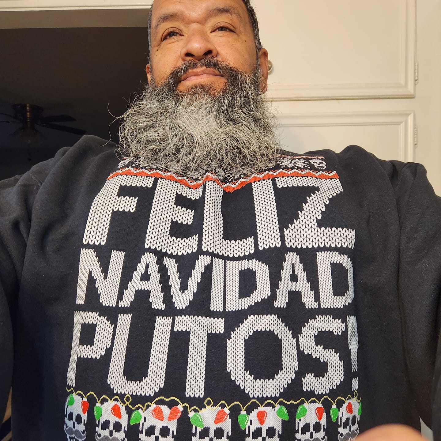 Customer photo review of Feliz Navidad Putos OG Navidad Sweatshirt
