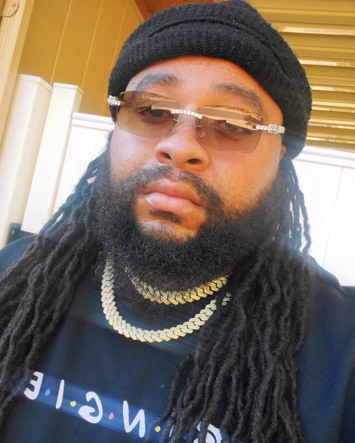 Customer photo review of Iced out Rimless Sunglasses Detroit style Buffs
