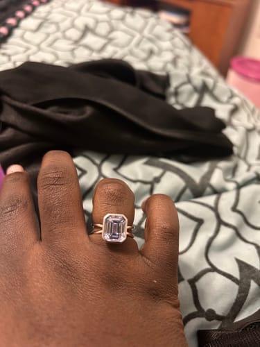 Customer photo review of Louily Elegant Emerald Cut Padparadscha Engagement Ring