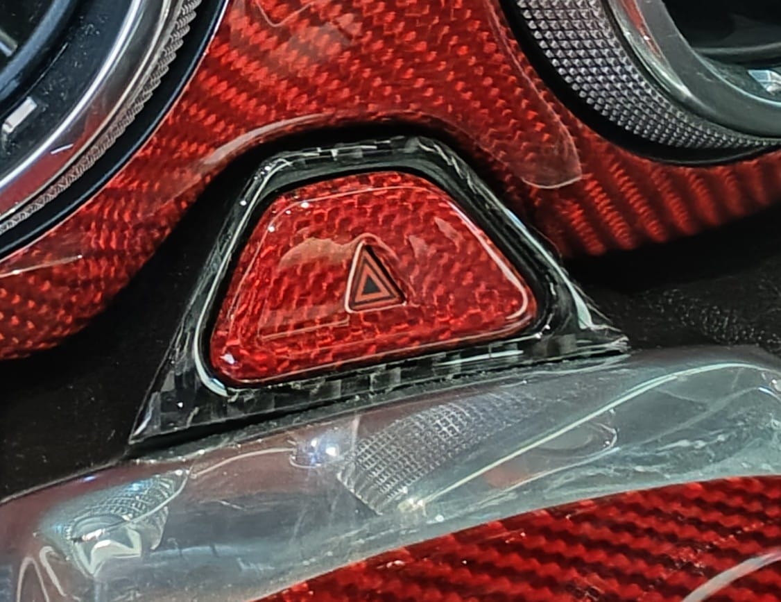 Customer photo review of 2016-2024 Chevy Camaro Real Carbon Fiber Interior Hazard Button Cover