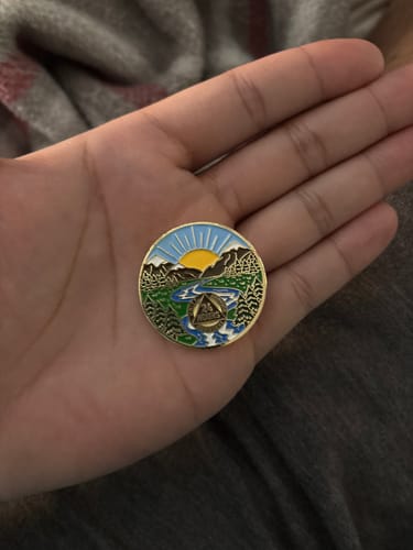 Customer photo review of 24 Hours Sobriety Mint Winding River Gold Plated AA Recovery Medallion - Twenty-Four Hours Chip/Coin