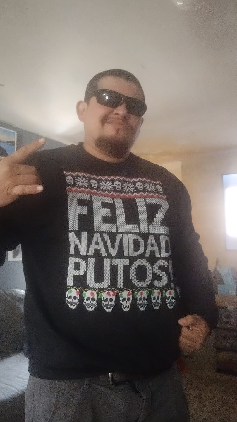 Customer photo review of Feliz Navidad Putos OG Navidad Sweatshirt