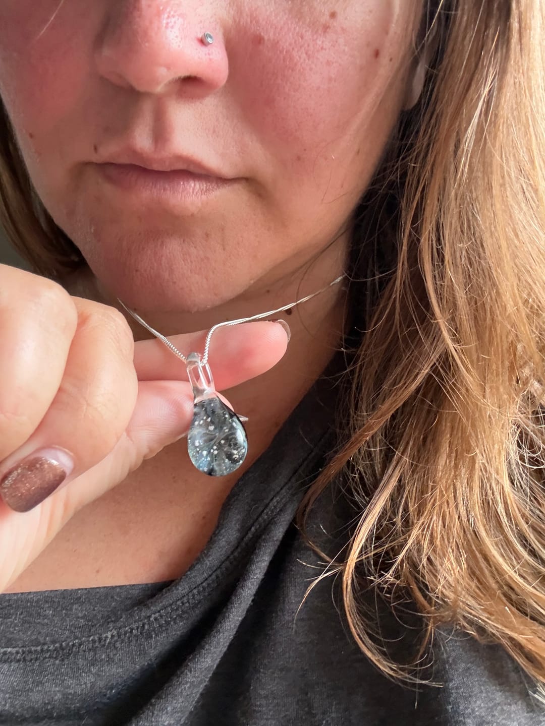 Customer photo review of Ghost Pendant with Infused Cremation Ashes