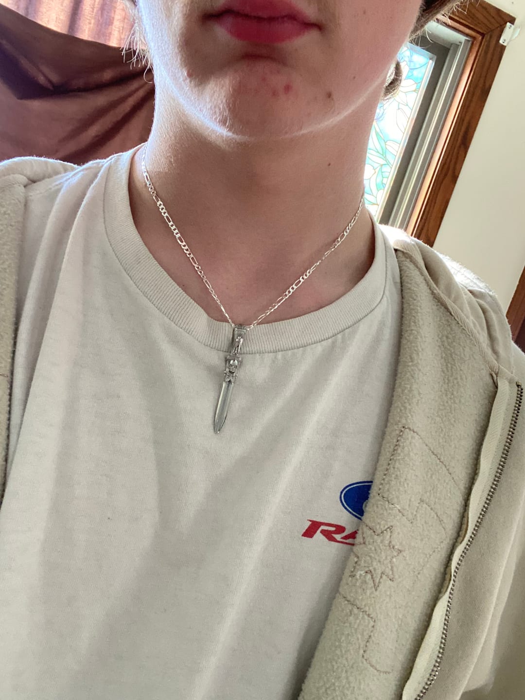 Customer photo review of CATACOMB SWORD PENDANT