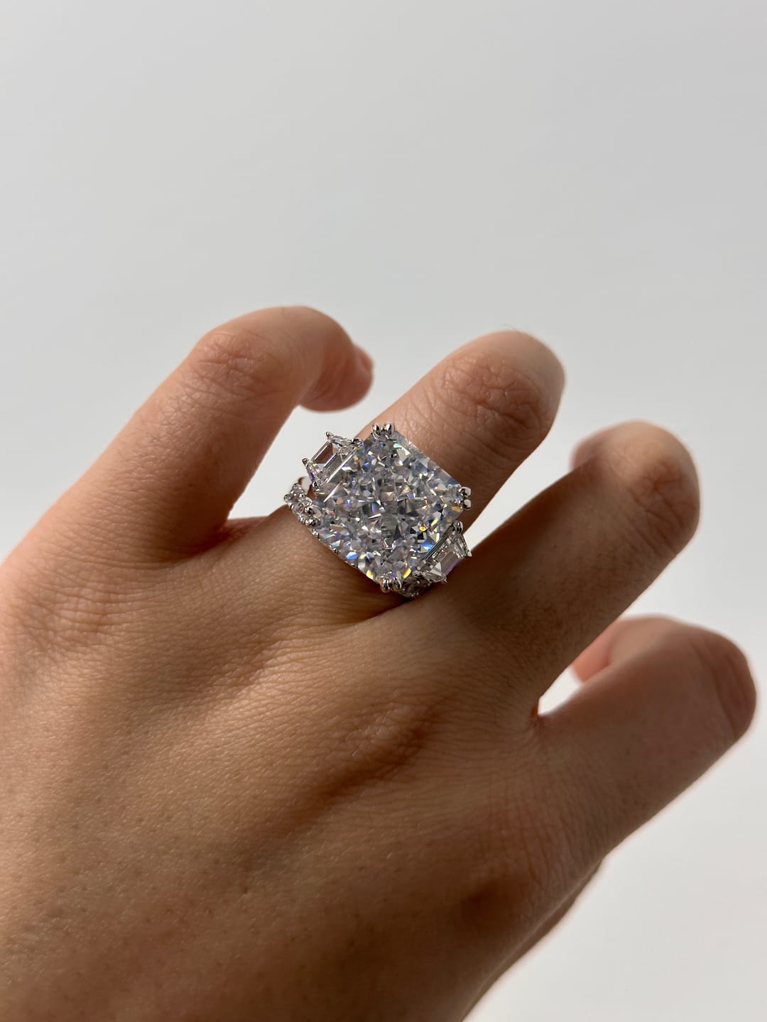 Customer photo review of S925 6.5/12.0 Ct Radiant Cut Crushed Ice Simulated Diamond Three-Stone Engagement Travel Ring