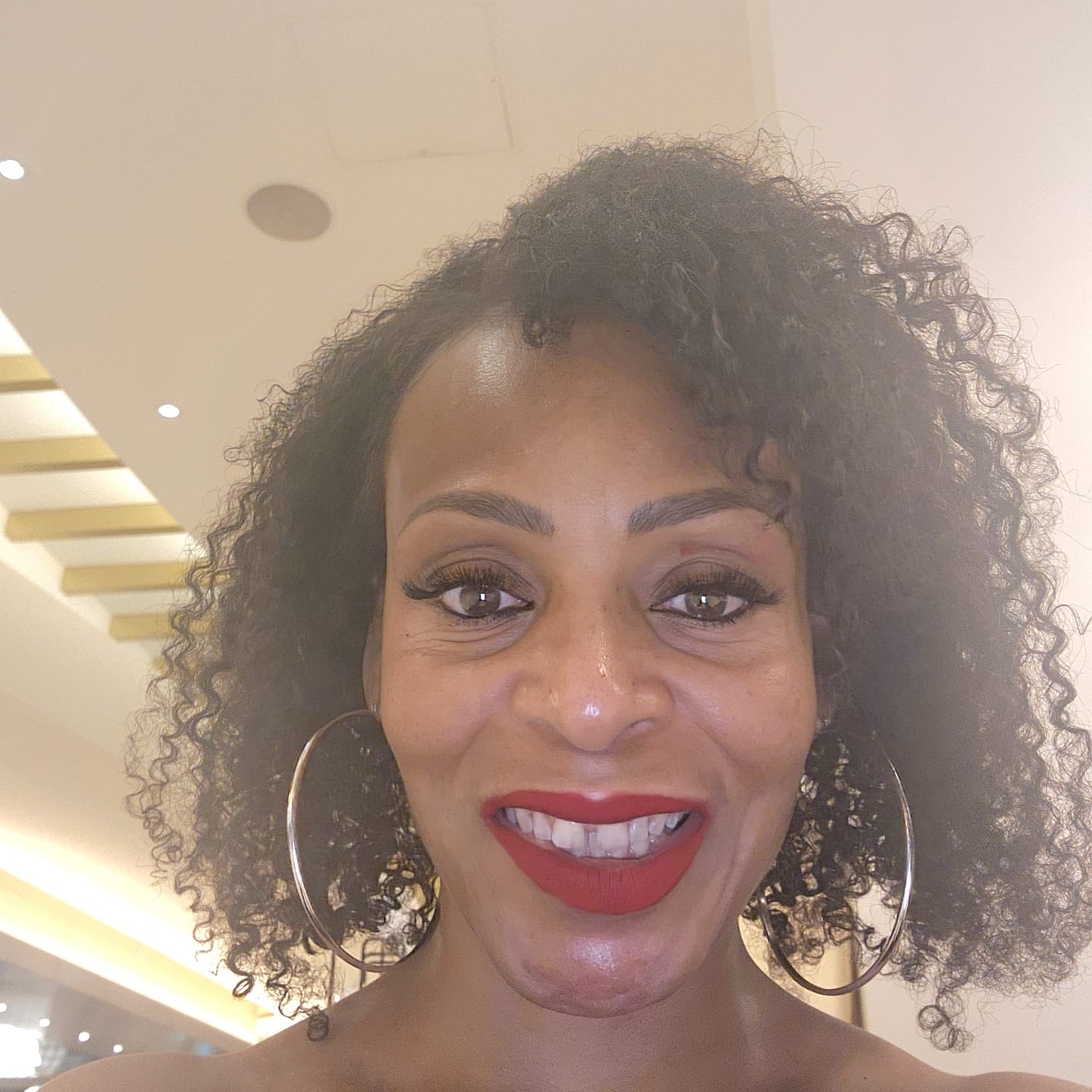 Customer photo review of Nicole Burmese 4A Kinky Curly - InvisiRoot™ Clip-ins (AKA TrueRoot™ Clip-ins)