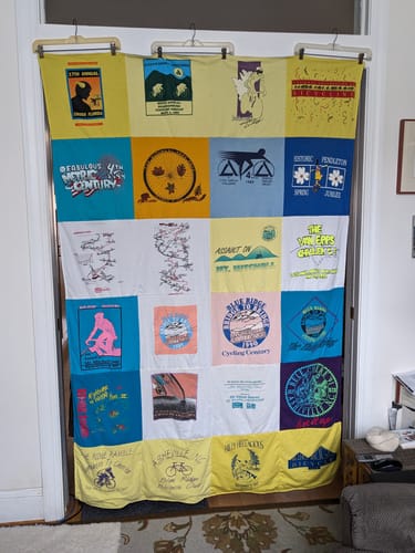 T-shirt quilt with cycling, outdoor activities themes by Patricia from NC