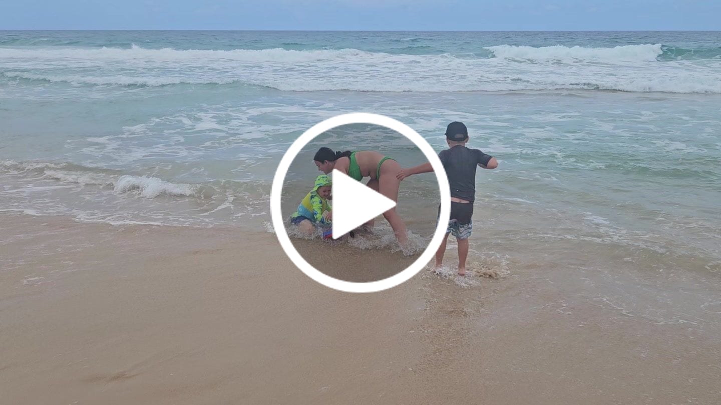 Customer video review of Fluro Green Sharks Kids' Rash Top