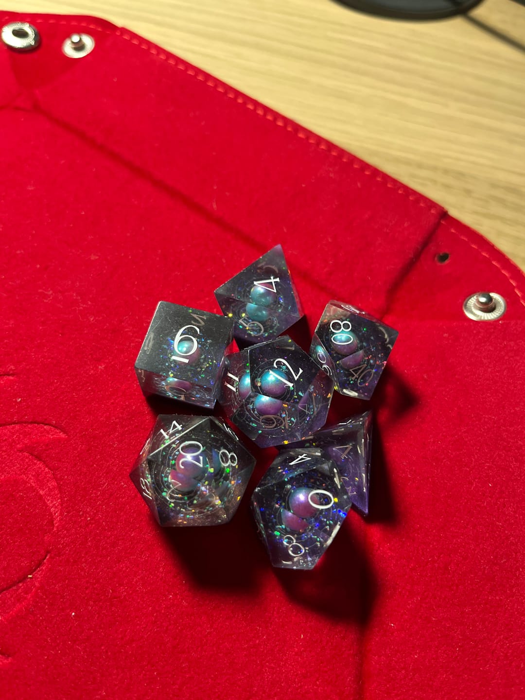 Customer photo review of URWizards D&D Resin Engraved Dice Set The Galaxy