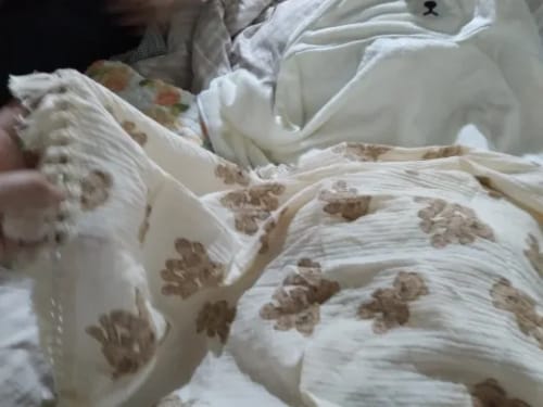 Customer photo review of Teddy Bear Muslin Tassel Blanket Swaddle