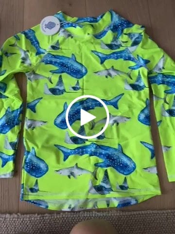 Customer video review of Fluro Green Sharks Kids' Rash Top
